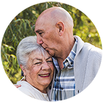 Elderly couple embracing